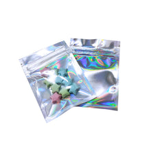 Load image into Gallery viewer, 100pcs S/M/L Flat Zip lock Bath Salt Cosmetic Bag One Side Clear Holographic Laser Mini Aluminum Foil Zip Lock Bags Thick