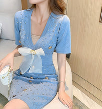 Load image into Gallery viewer, Sexy Deep V-neck Hollow out Knitted Dresses 2021 Summer Women Sweet Bowknot Dimond Beaded Short Sleeve Bodycon Sweater Dress