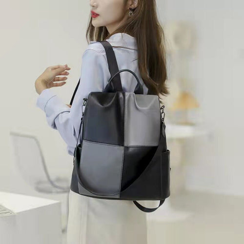 The new backpack trendy fashion simple female bag hit color one-shoulder handbag